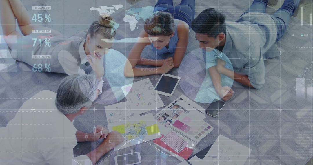 Diverse Team Collaborating on Project with Digital Overlay