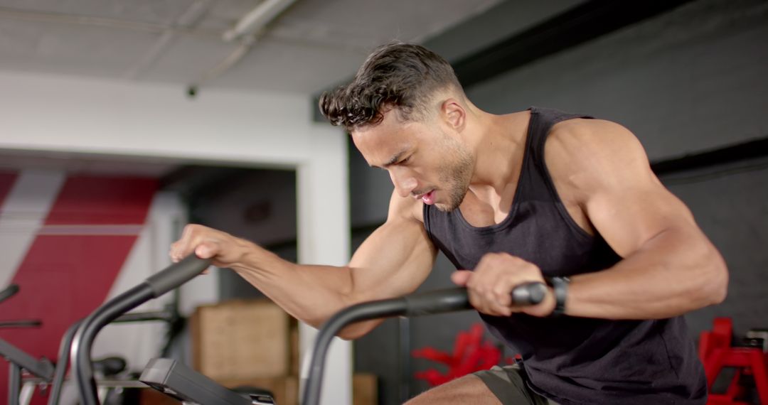 Intense Cardio Session on Stationary Bike in Gym