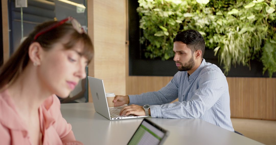 Modern Coworking Environment with Professionals Using Technology