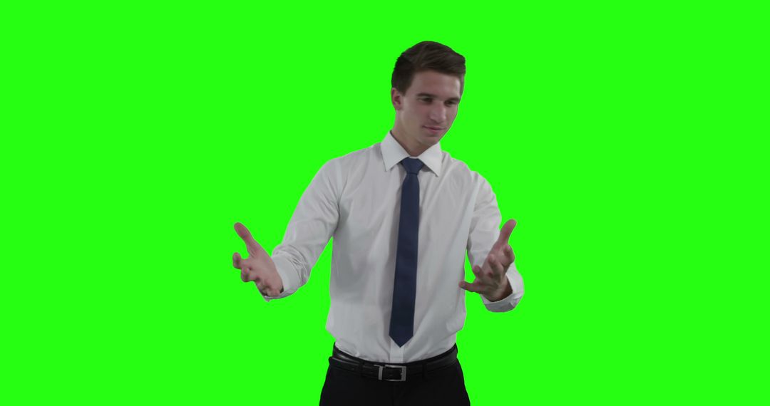 Businessman in white shirt and tie making gestures on green screen - Free Images, Stock Photos and Pictures on Pikwizard.com