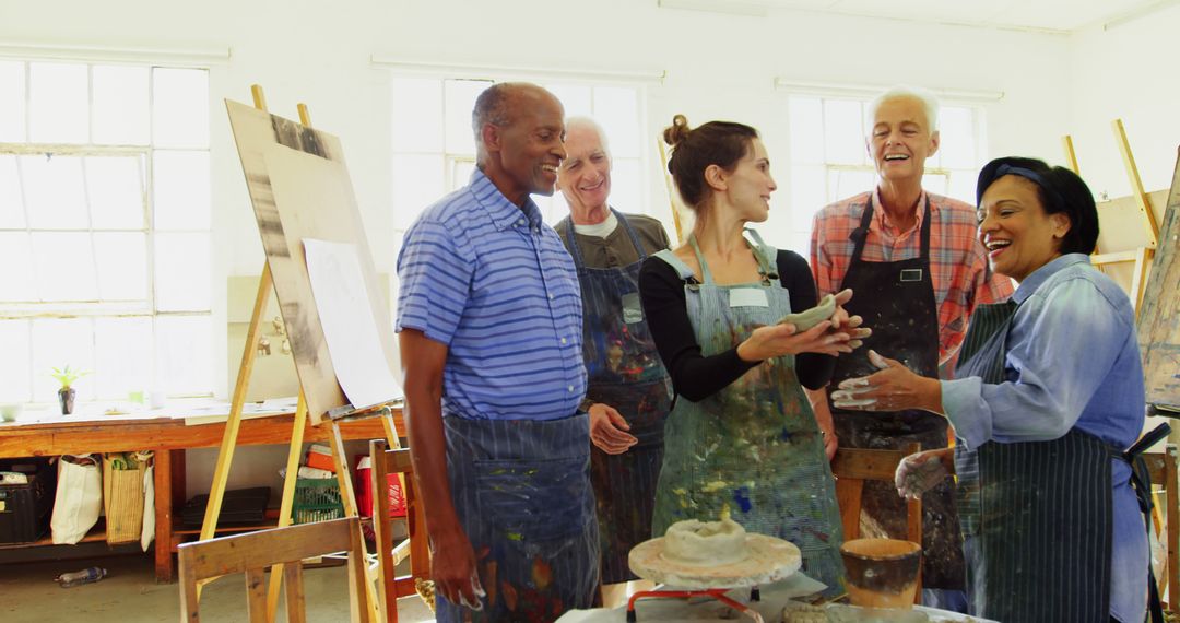 Diverse Group of Adults Enjoying Art Class in Studio