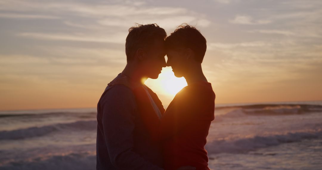 Romantic senior caucasian couple embracing by sea silhouetted at sunset, copy space - Free Images, Stock Photos and Pictures on Pikwizard.com