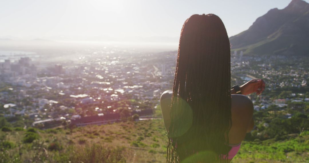 Woman Overlooking Scenic Cityscape with Mountain View - Free Images, Stock Photos and Pictures on Pikwizard.com