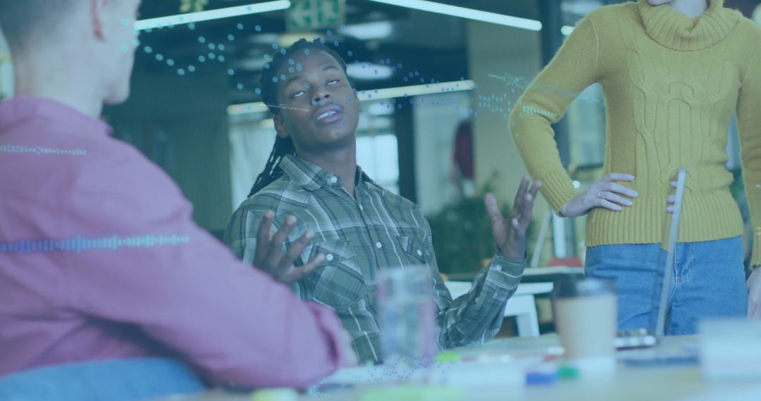 Diverse Professionals Collaborating in Modern Office on Tech Project