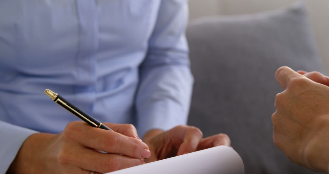 Therapist Taking Notes During Counseling Session with Patient - Free Images, Stock Photos and Pictures on Pikwizard.com