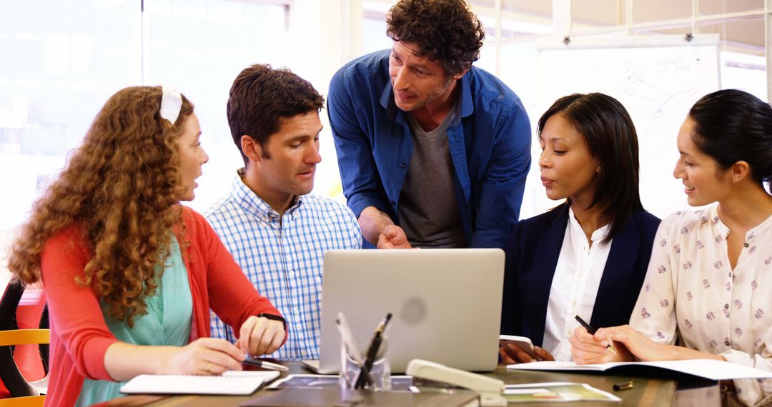 Multicultural Team Collaborating in Office Setting