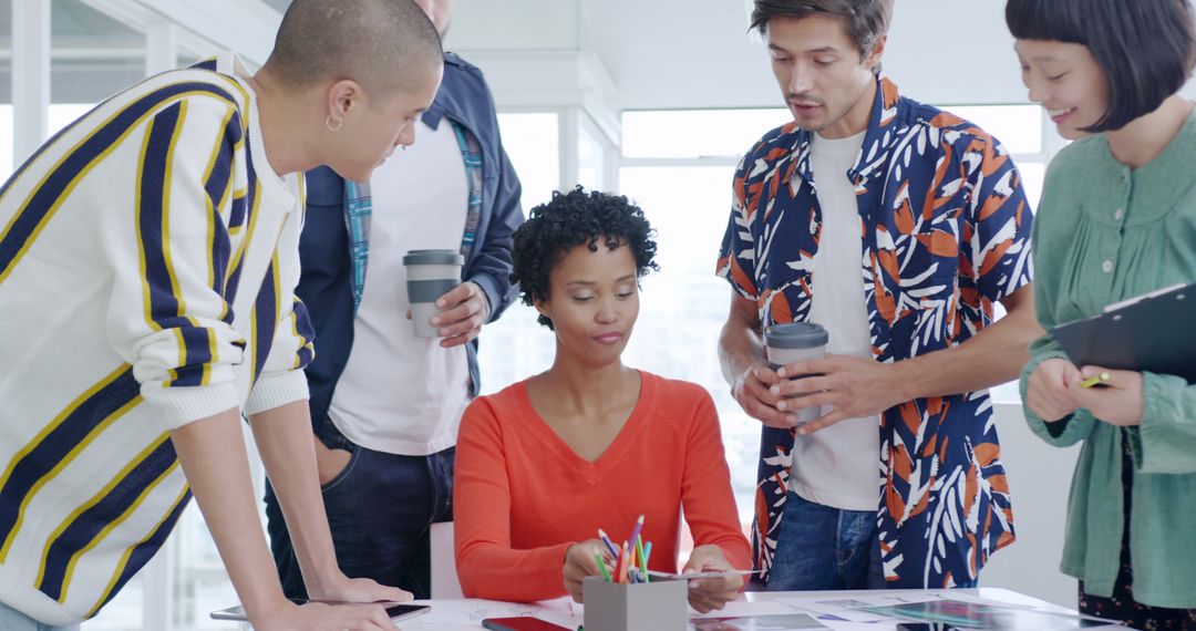 Diverse Team Collaborating in Bright Office During Creative Meeting