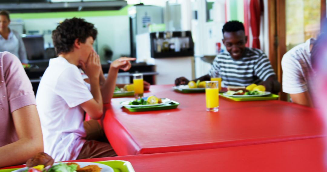 Youth Enjoying Meal in Casual Restaurant Setting with Copy Space