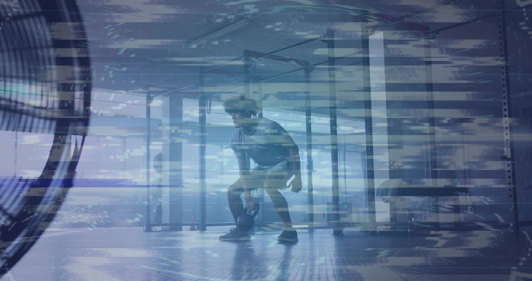 Man Squatting with VR Headset in Futuristic Gym Setting