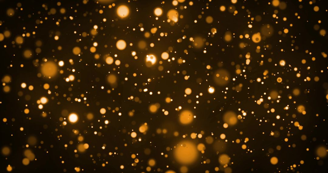 Mesmerizing Golden Light Particles on Dark Background