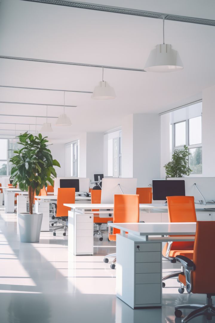 Modern Open Office with Orange Chairs and Computers - Free Images, Stock Photos and Pictures on Pikwizard.com