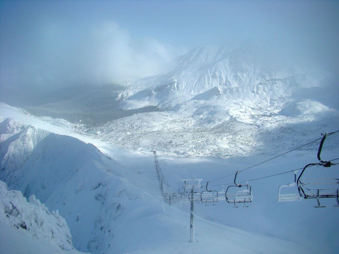 Snow-Covered Mountain Landscape with Ski Lift - Free Images, Stock Photos and Pictures on Pikwizard.com