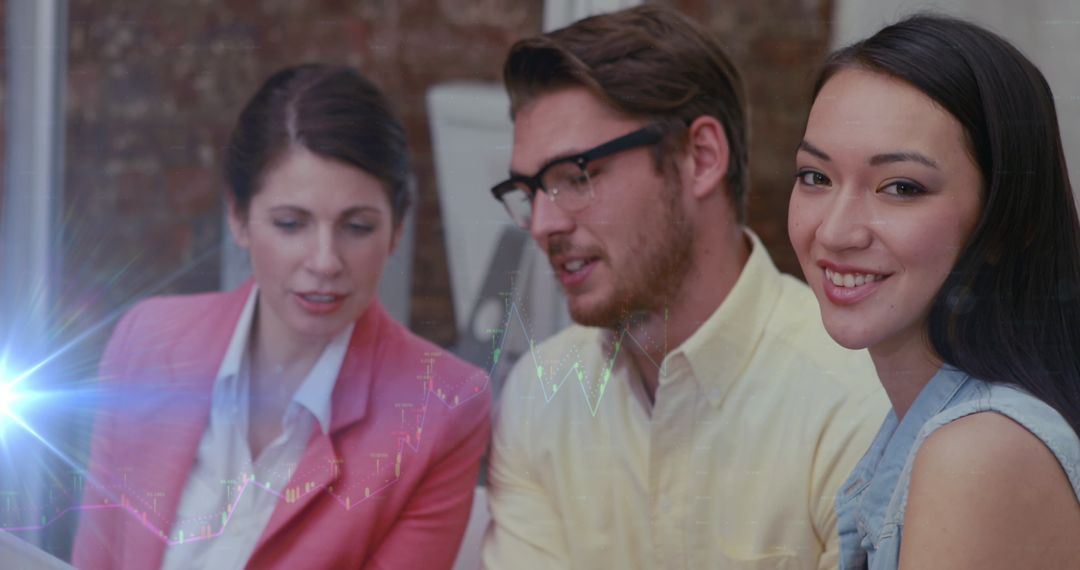 Young Professionals Collaborating with Digital Interface