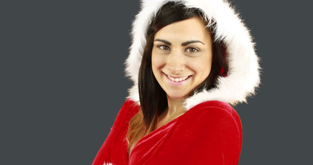 Smiling Woman in Red Fur-Trimmed Santa Costume - Free Images, Stock Photos and Pictures on Pikwizard.com