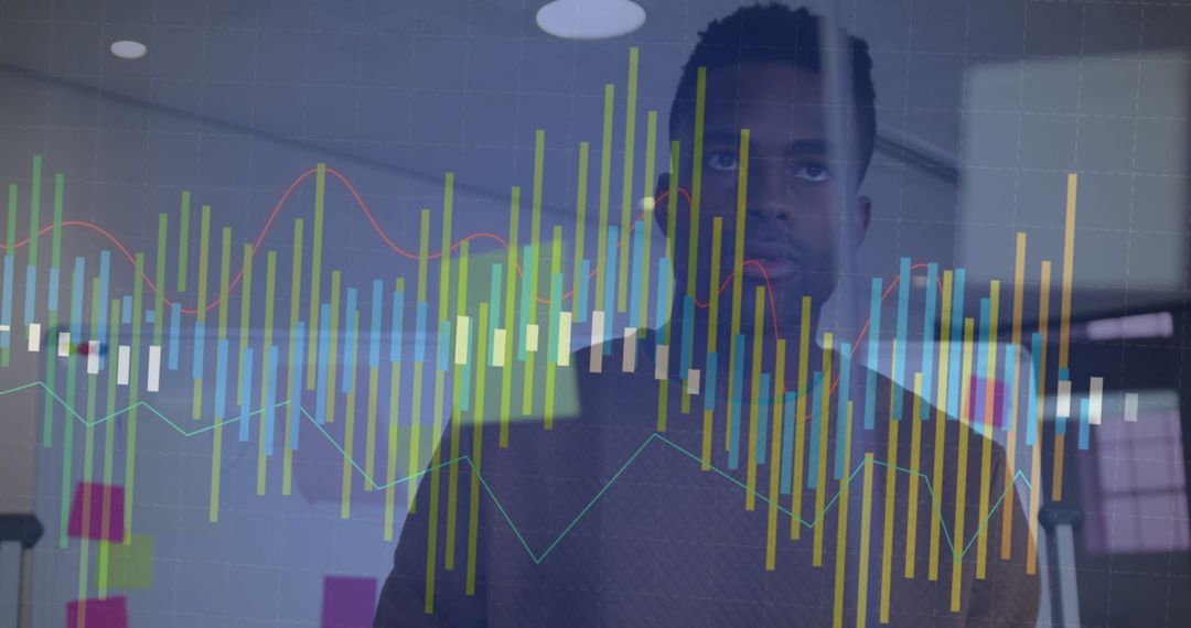Businessman Analyzing Digital Charts in Modern Office Setting