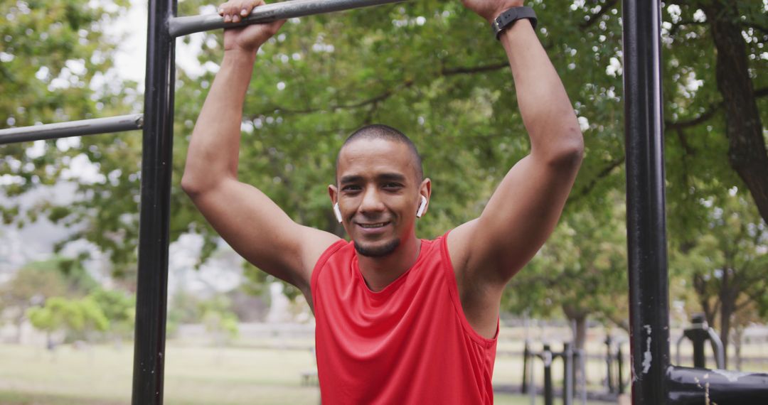 Fit Man Smiling During Outdoor Workout at Park - Free Images, Stock Photos and Pictures on Pikwizard.com