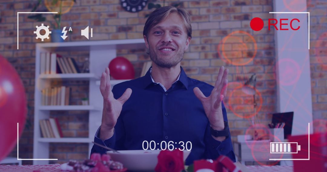 Man Conducting Online Video Call in Home Setting with Interactive Elements