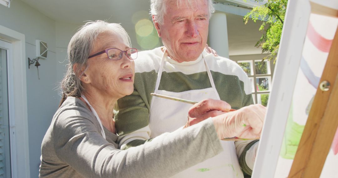 Elderly Couple Enjoying Outdoor Painting Session Together - Free Images, Stock Photos and Pictures on Pikwizard.com