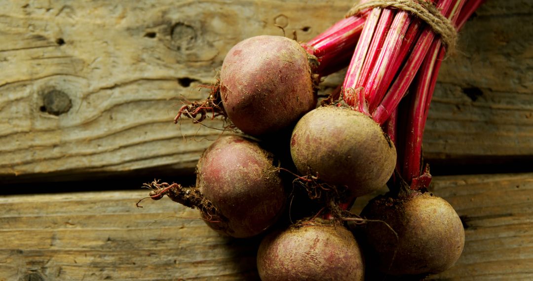 Fresh Organic Beetroots Bunch on Rustic Wooden Table - Free Images, Stock Photos and Pictures on Pikwizard.com