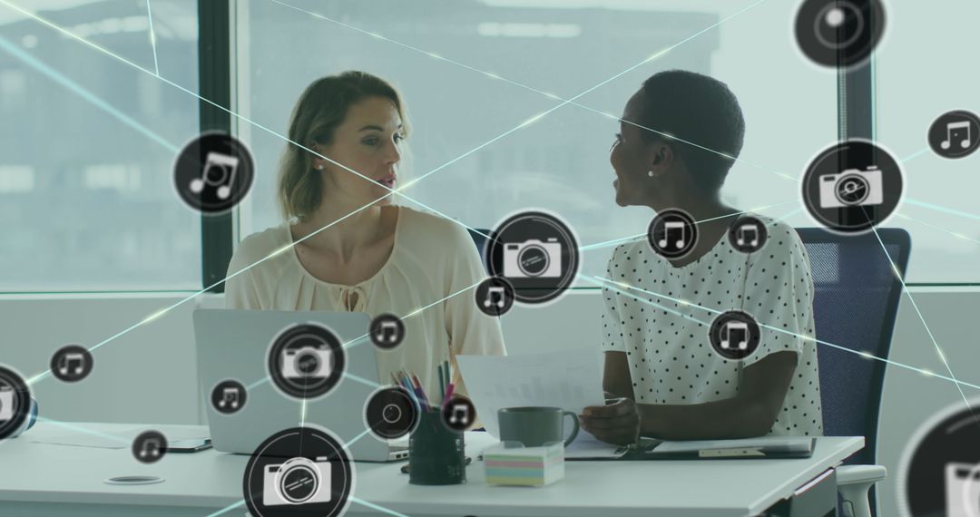 Diverse Coworkers Discussing Reports in Modern Office Setting