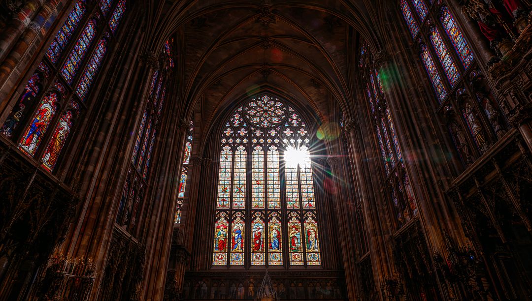 Sunlight Through Stained Glass in Gothic Cathedral