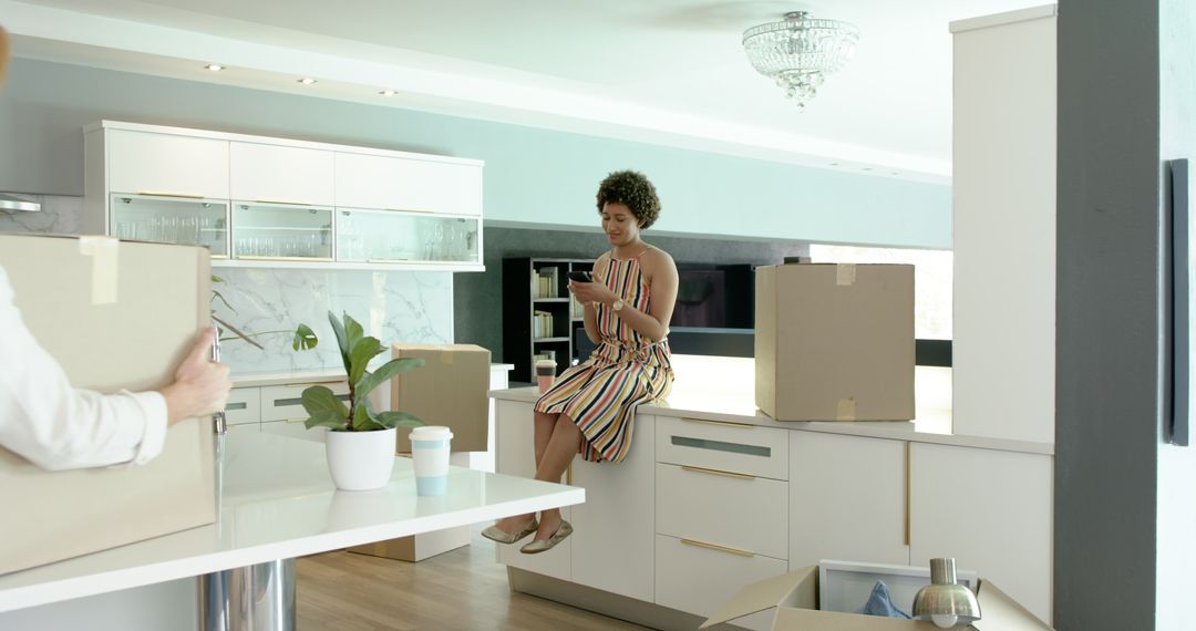Diverse Couple Enjoying New Kitchen Amid Moving Process