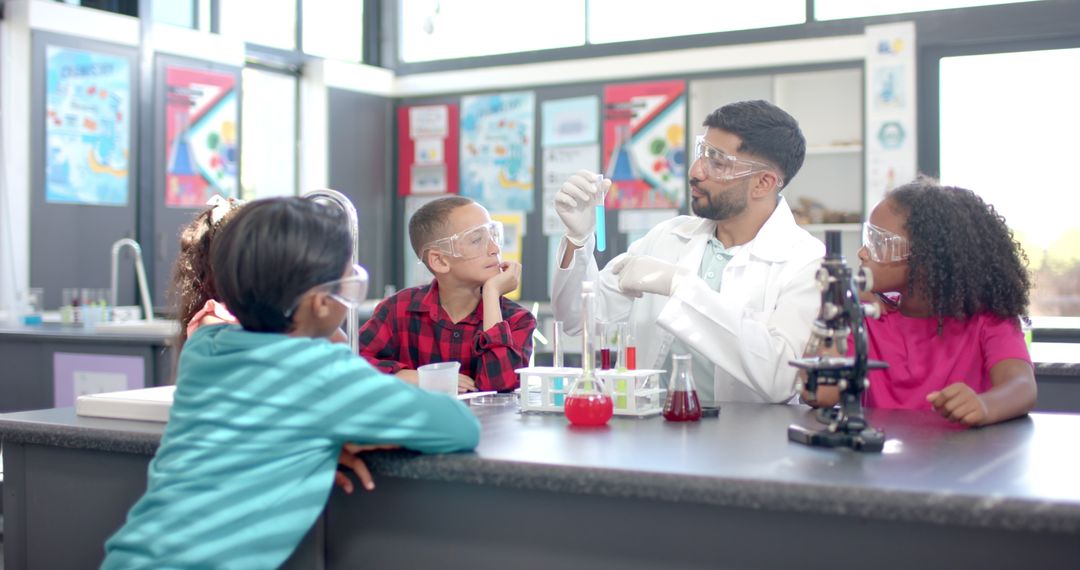 Teacher Demonstrating Science Experiment to Diverse Group of Students