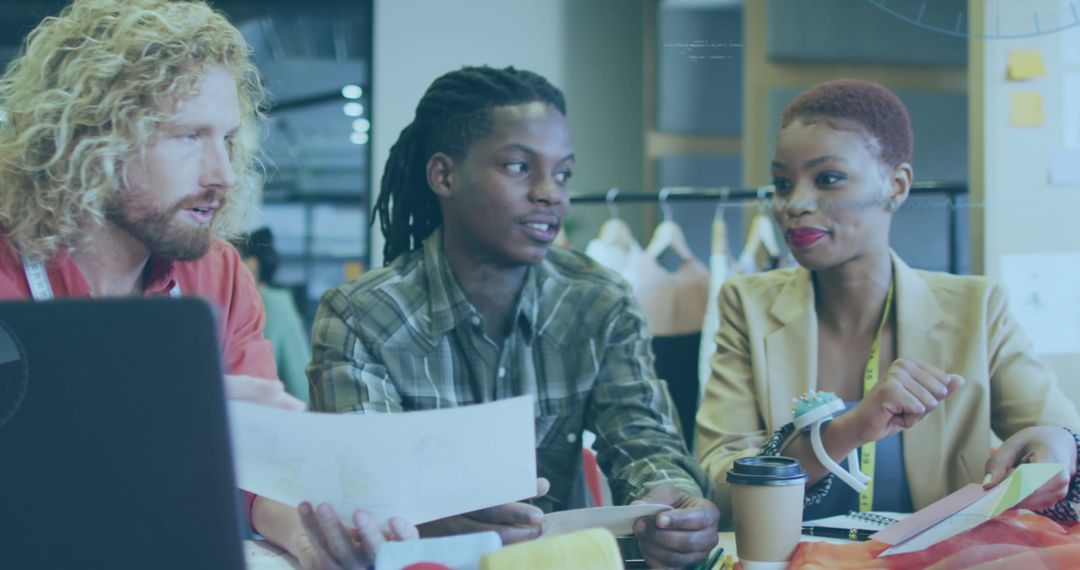 Diverse Team Collaborating in Modern Open Office Workspace