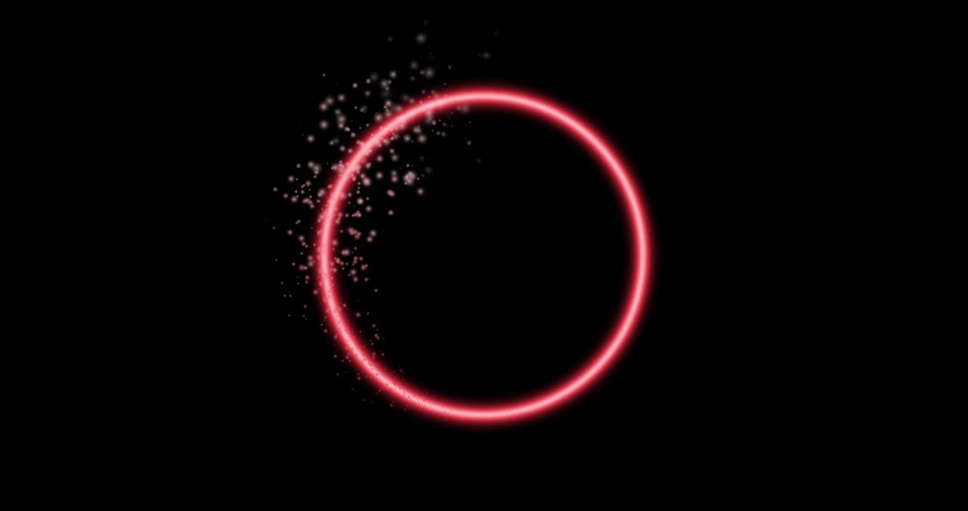Glowing Pink Neon Circle with Sparkling Particles on Black