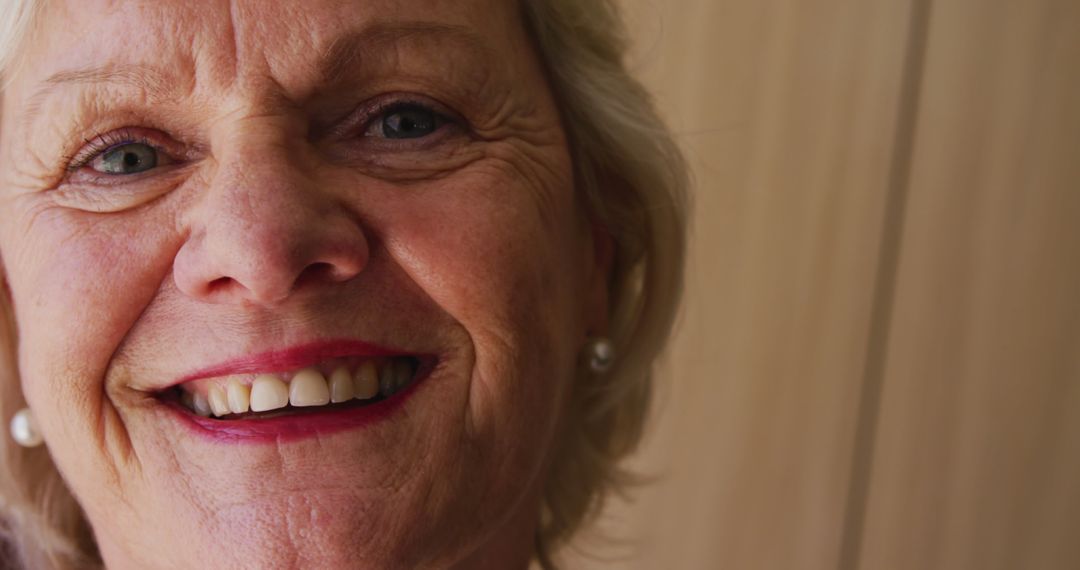 Senior Woman Smiling with Joyful Expression at Home