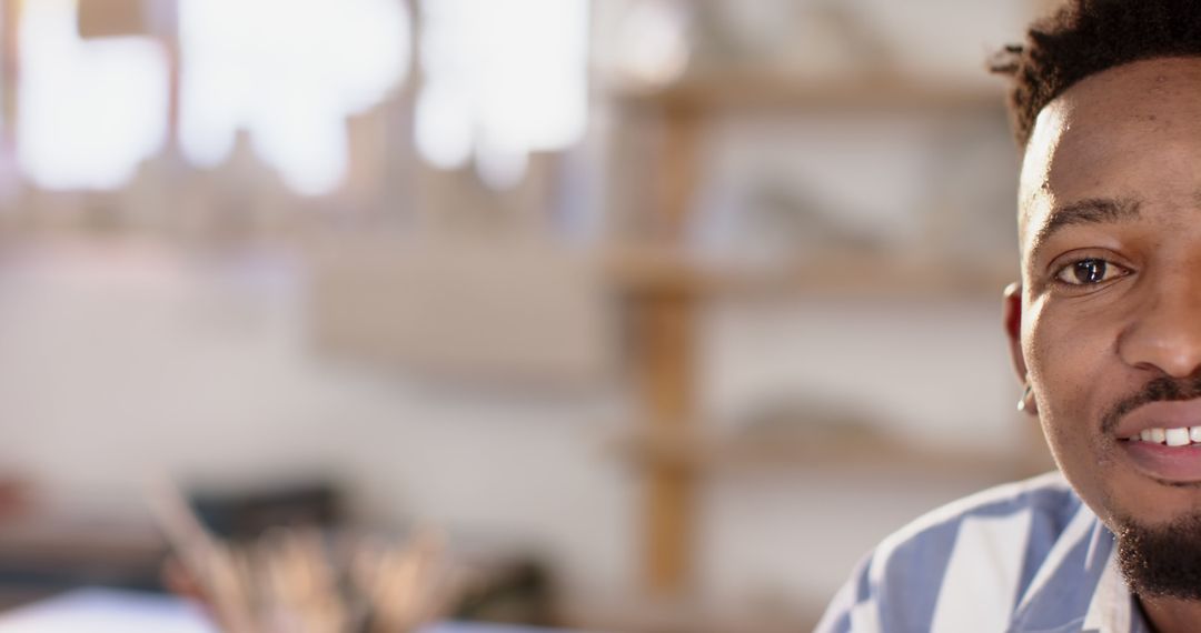 Smiling Pottery Artisan in Creative Studio Space