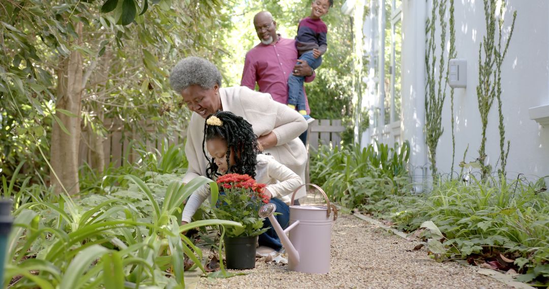 Grandparents and Grandchildren Gardening Outdoors - Free Images, Stock Photos and Pictures on Pikwizard.com