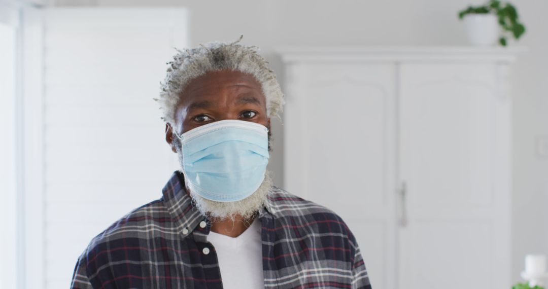 Elderly Man Wearing Face Mask Indoors - Free Images, Stock Photos and Pictures on Pikwizard.com