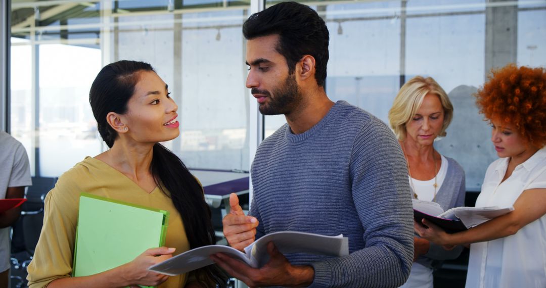 Diverse Colleagues Collaborating in Office Space