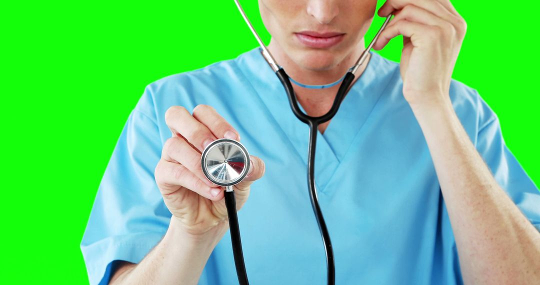 Healthcare Professional Holding Stethoscope on Green Screen Background - Free Images, Stock Photos and Pictures on Pikwizard.com