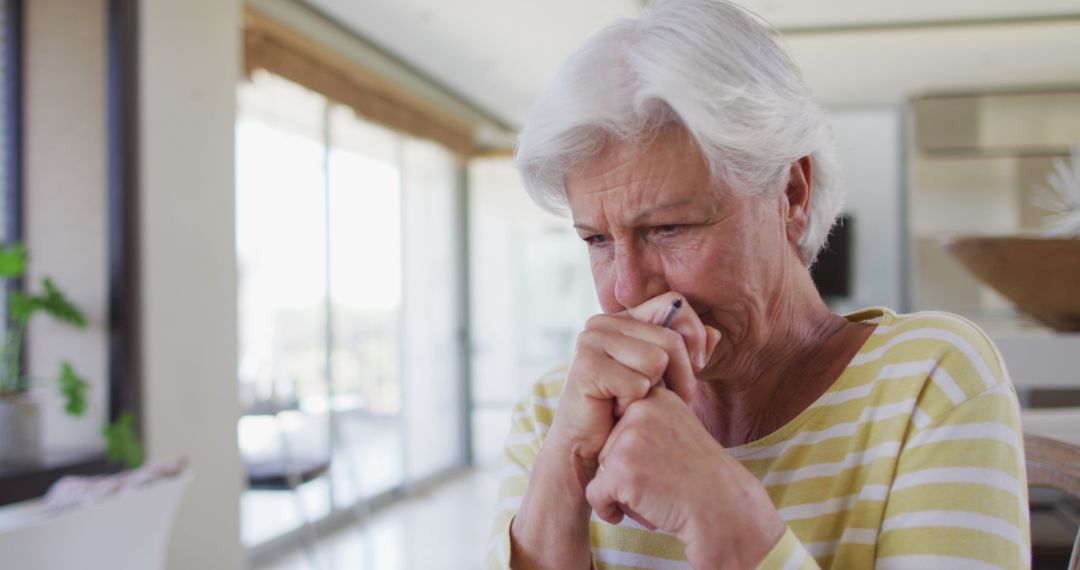 Elderly Woman Coughing in Comfort of Home - Free Images, Stock Photos and Pictures on Pikwizard.com