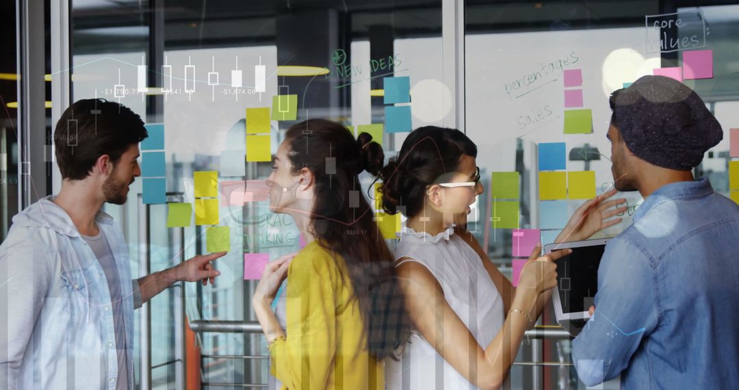 Innovative Team Collaborating in Modern Office with Sticky Notes
