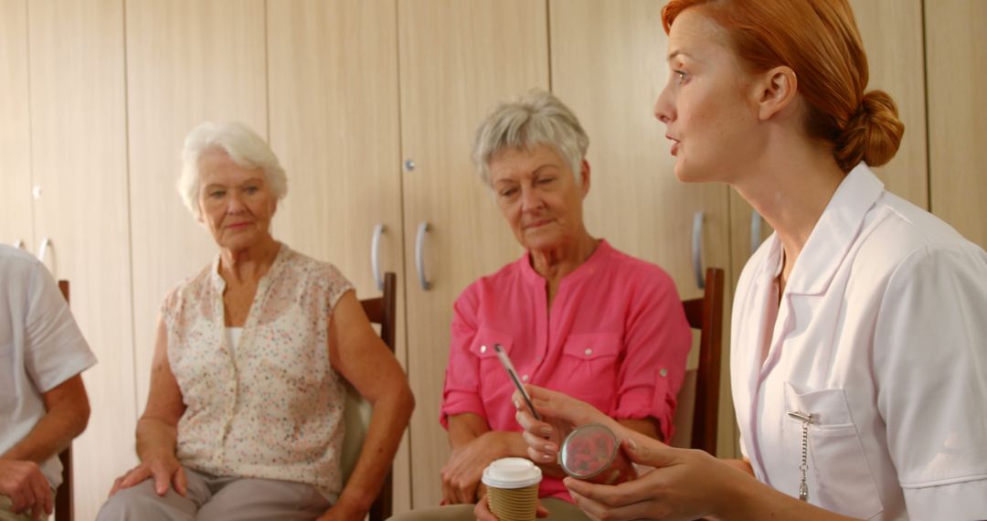 Healthcare Professional Leading Group Therapy Session for Elderly - Free Images, Stock Photos and Pictures on Pikwizard.com