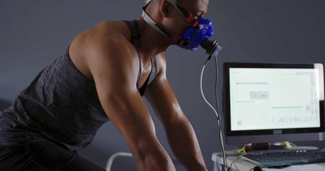 Athlete Undergoing VO2 Max Test on Stationary Bike - Free Images, Stock Photos and Pictures on Pikwizard.com