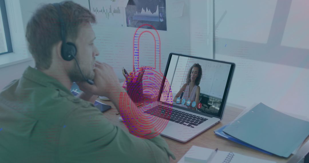Man in Headset Conducting Laptop Video Call with Biometric Fingerprint Overlay