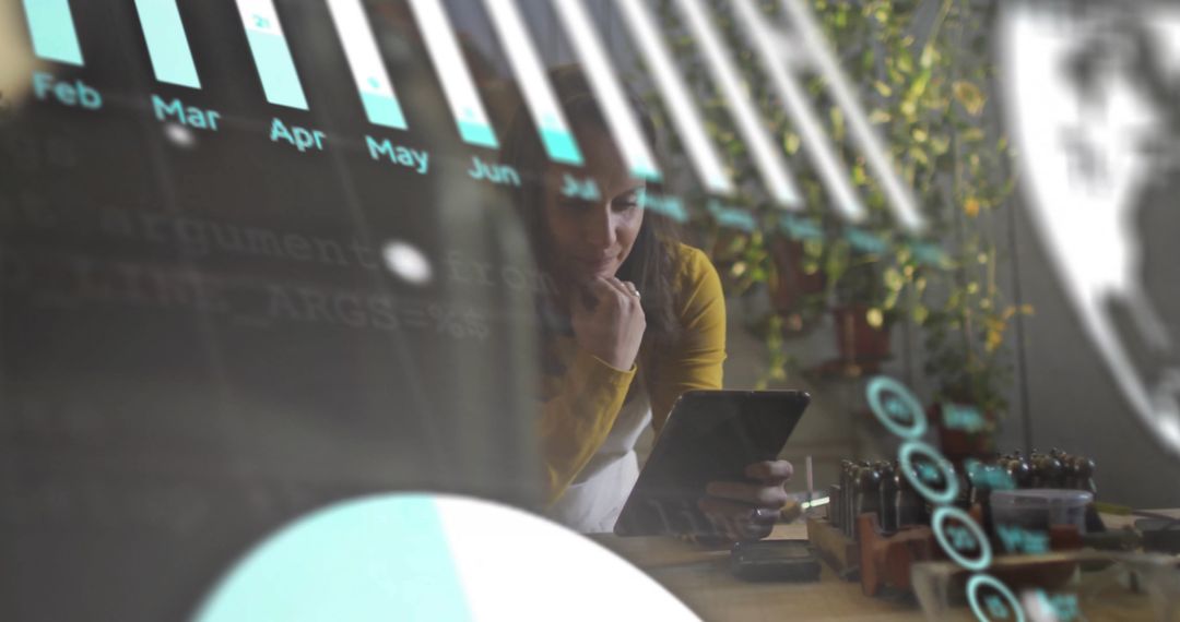 Businesswoman Reviewing Data Analytics on Tablet