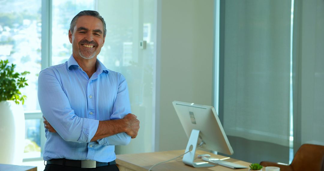 Confident Businessman in Modern Office Setting Showing Professionalism