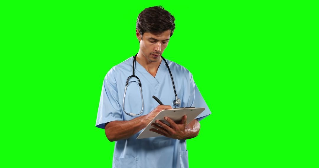 Male Nurse Writing on Clipboard With Green Screen Background - Free Images, Stock Photos and Pictures on Pikwizard.com