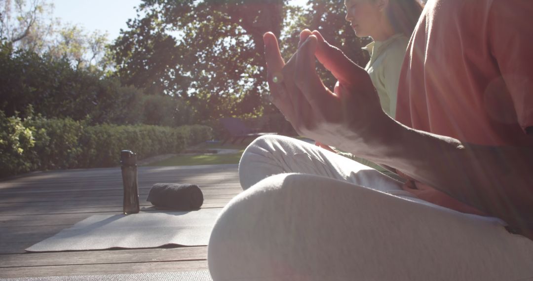 People Meditating Outdoors on Sunny Day in Nature - Free Images, Stock Photos and Pictures on Pikwizard.com