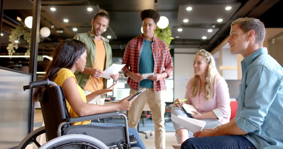 Diverse Team Engaged in Creative Brainstorming in Modern Office