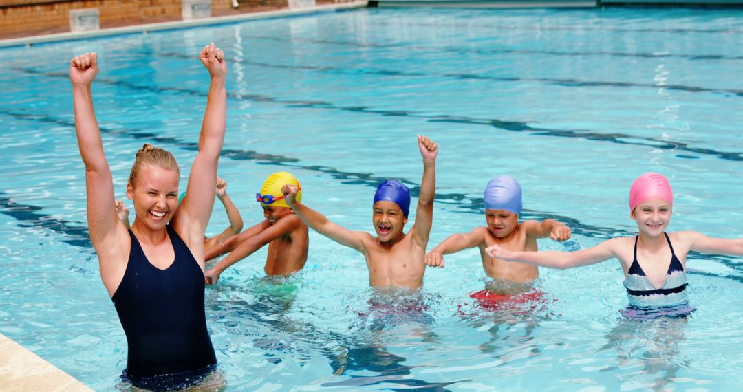 Swimming Instructor Excited with Happy Children in Pool - Free Images, Stock Photos and Pictures on Pikwizard.com