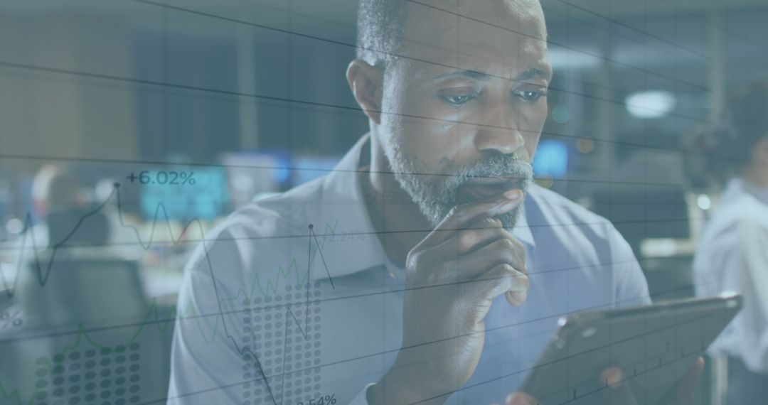 Businessman Consulting Financial Data on Digital Tablet for Analysis