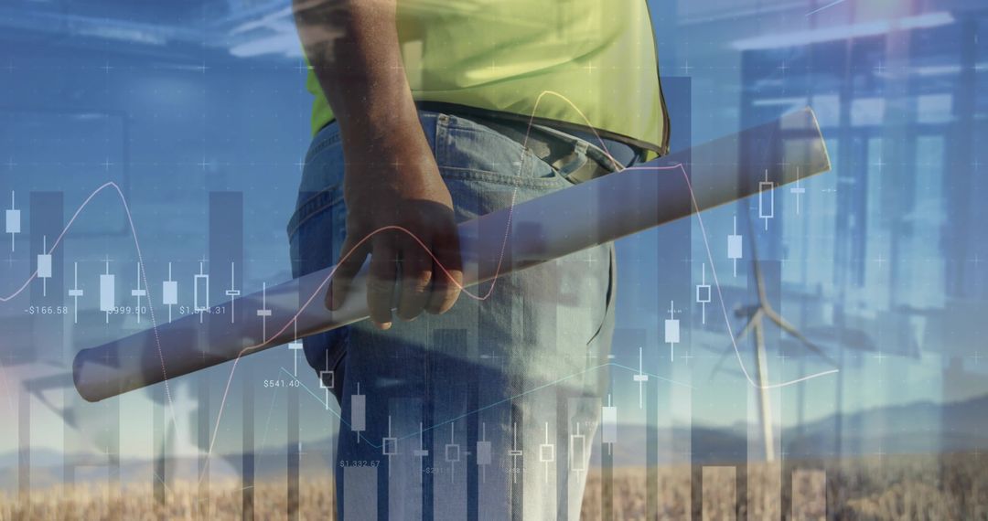 Engineer Analyzing Sustainable Energy with Overlaid Charts