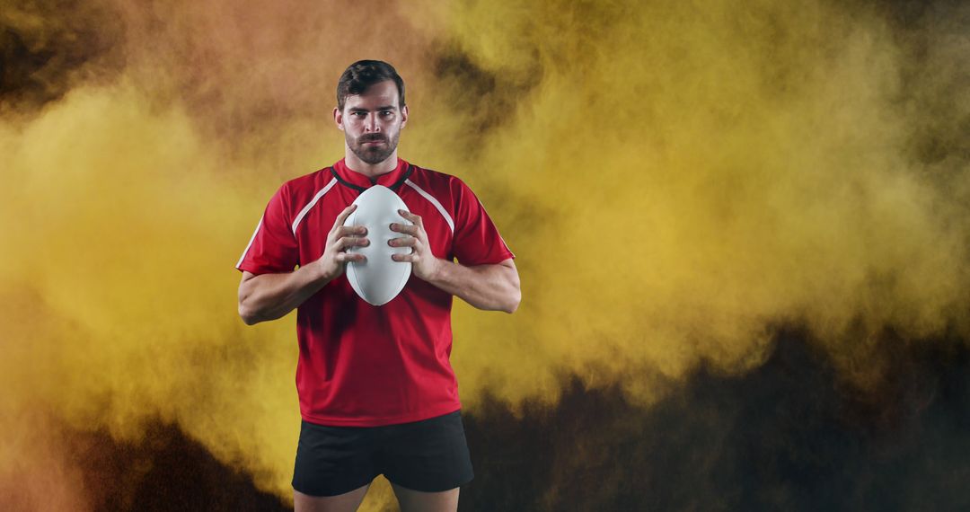 Rugby Player in Red Kit Holding Ball with Determination - Free Images, Stock Photos and Pictures on Pikwizard.com