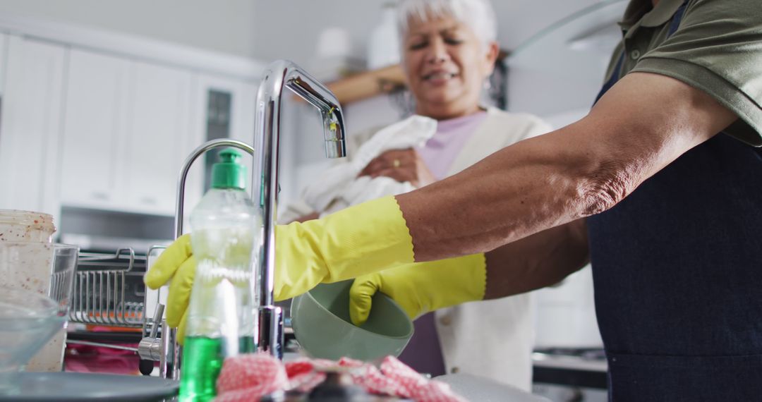 Senior Couple Enjoying Kitchen Efficiency and Teamwork